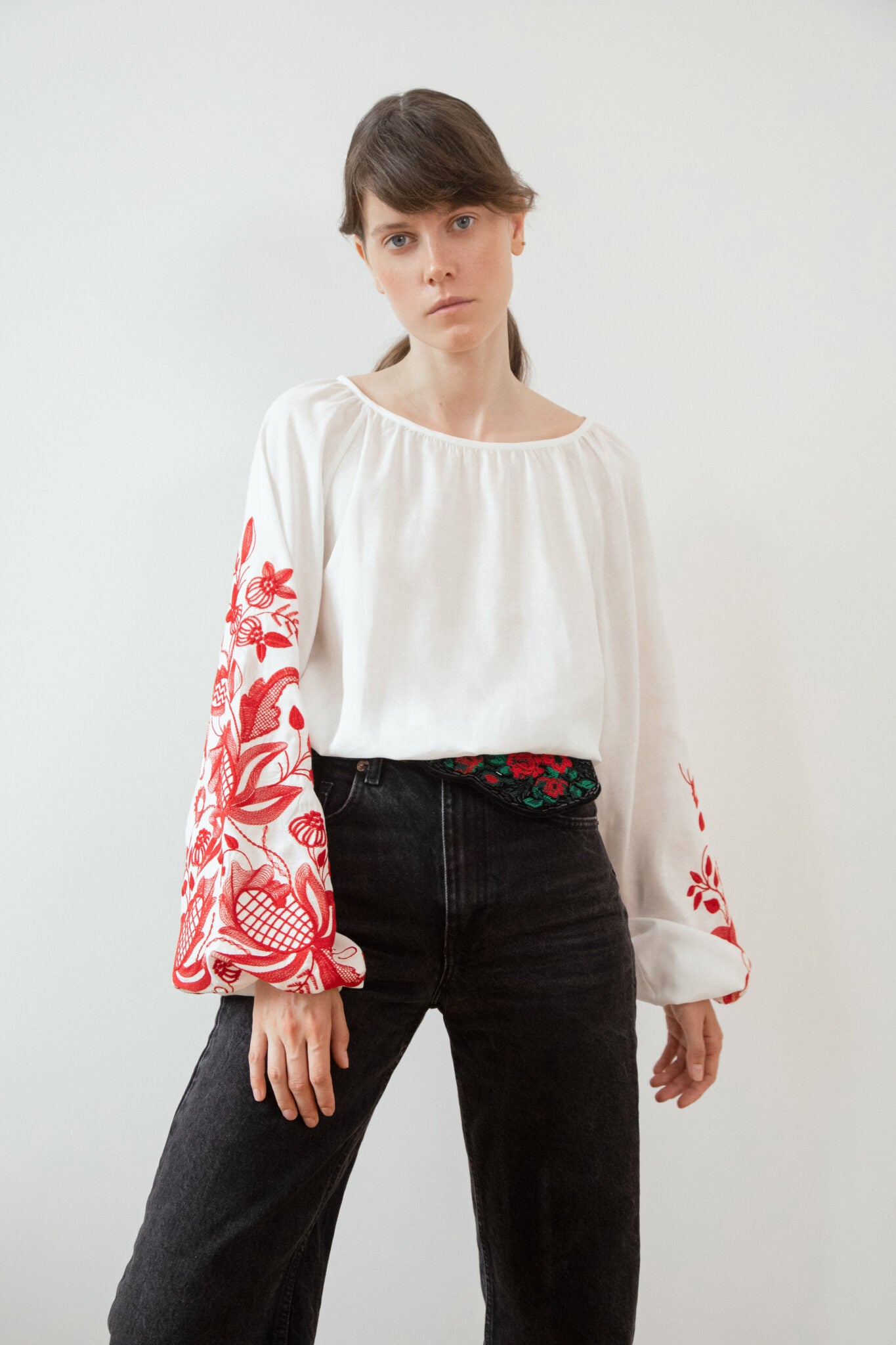 Blouse based on the motifs of a traditional shirt with designer embroidery