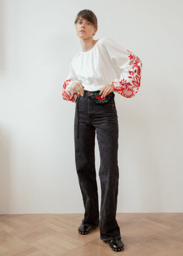 Blouse based on the motifs of a traditional shirt with designer embroidery