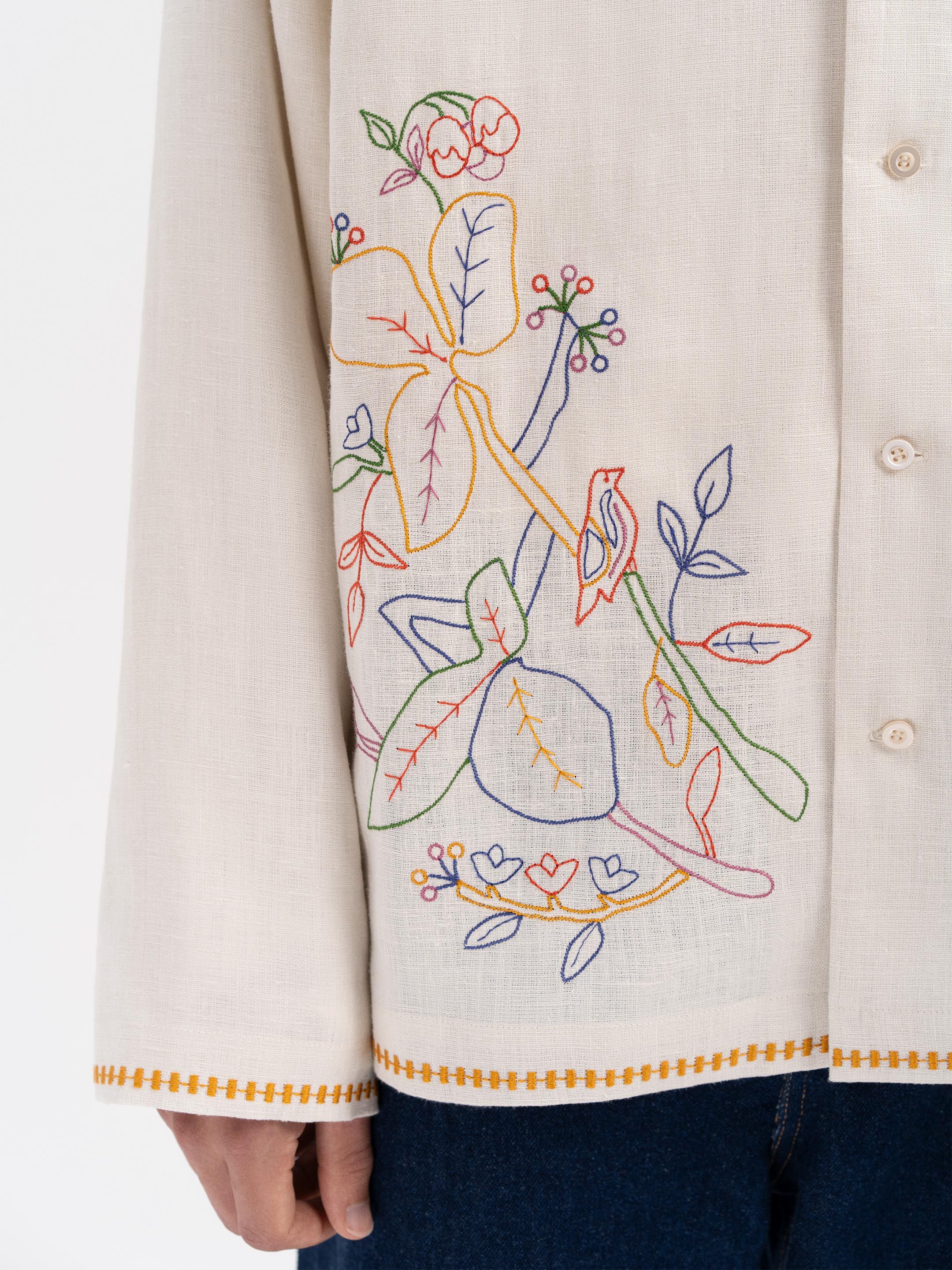 Light shirt with colored embroidery "Hlid"