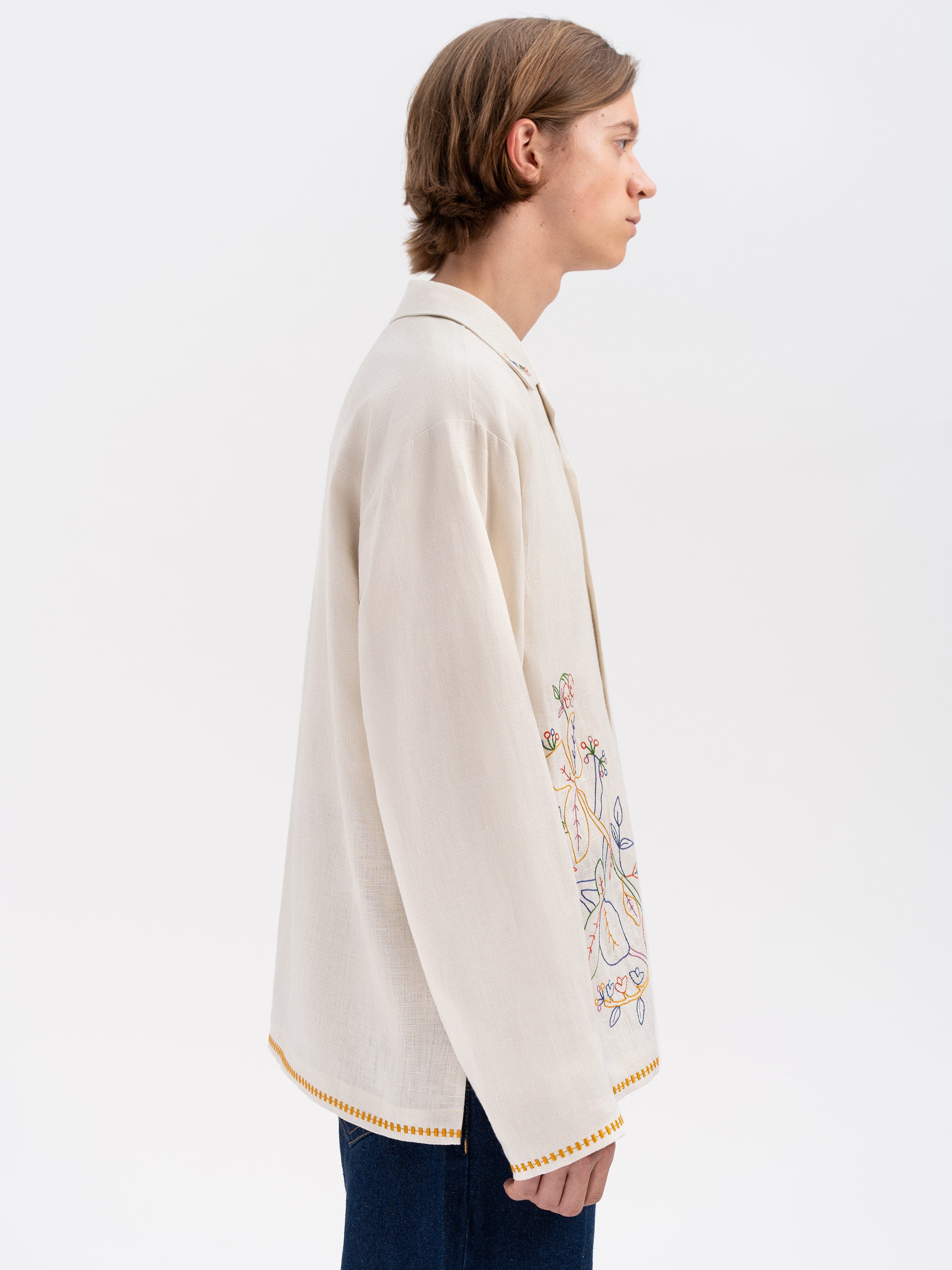 Light shirt with colored embroidery "Hlid"