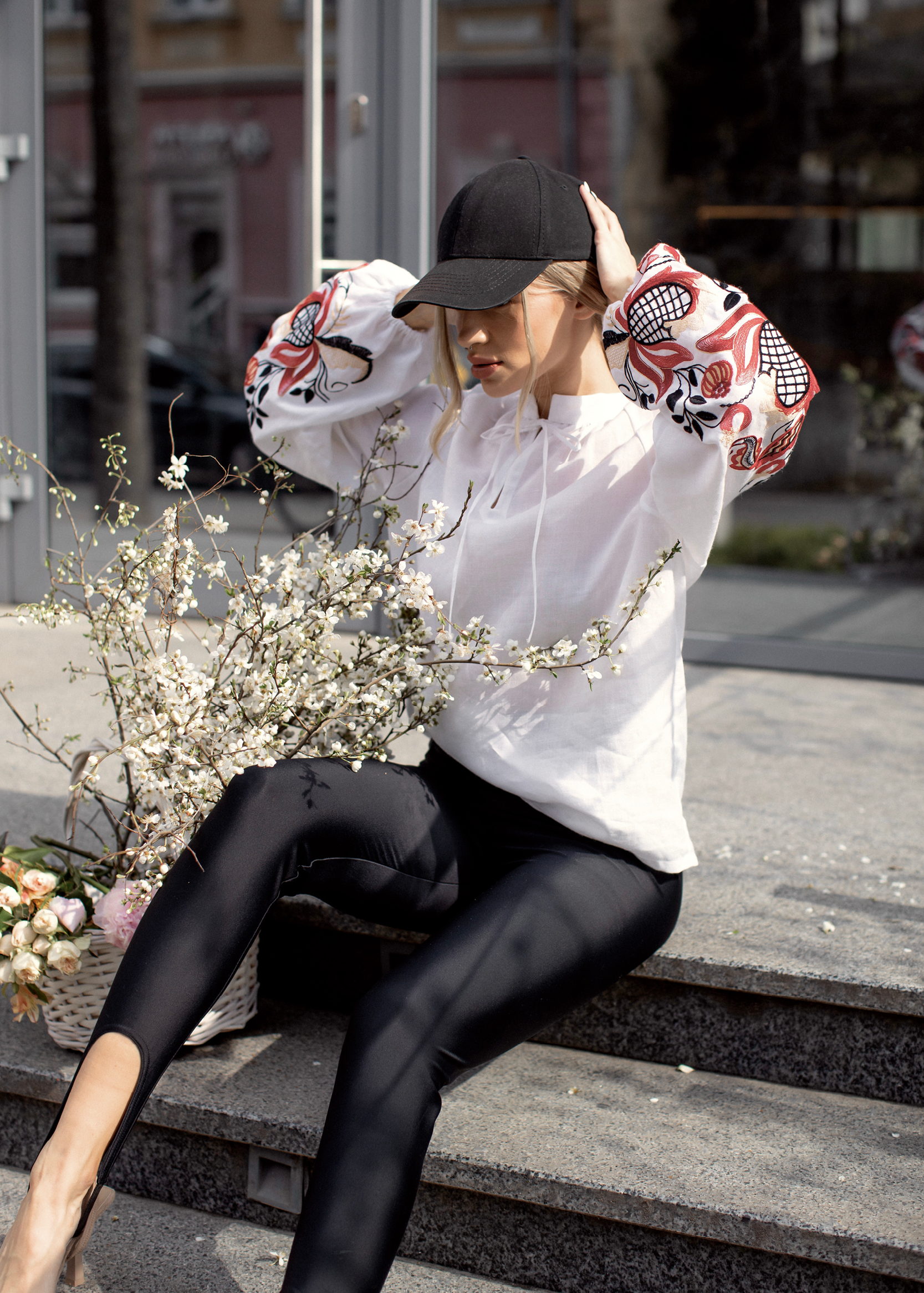 Blouse inspired by a traditional shirt with designer embroidery (colorful ornament)
