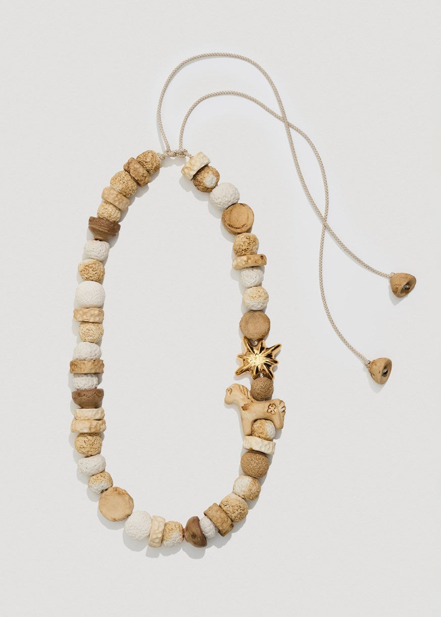 Necklace "Drimota" milky beads with a gold star