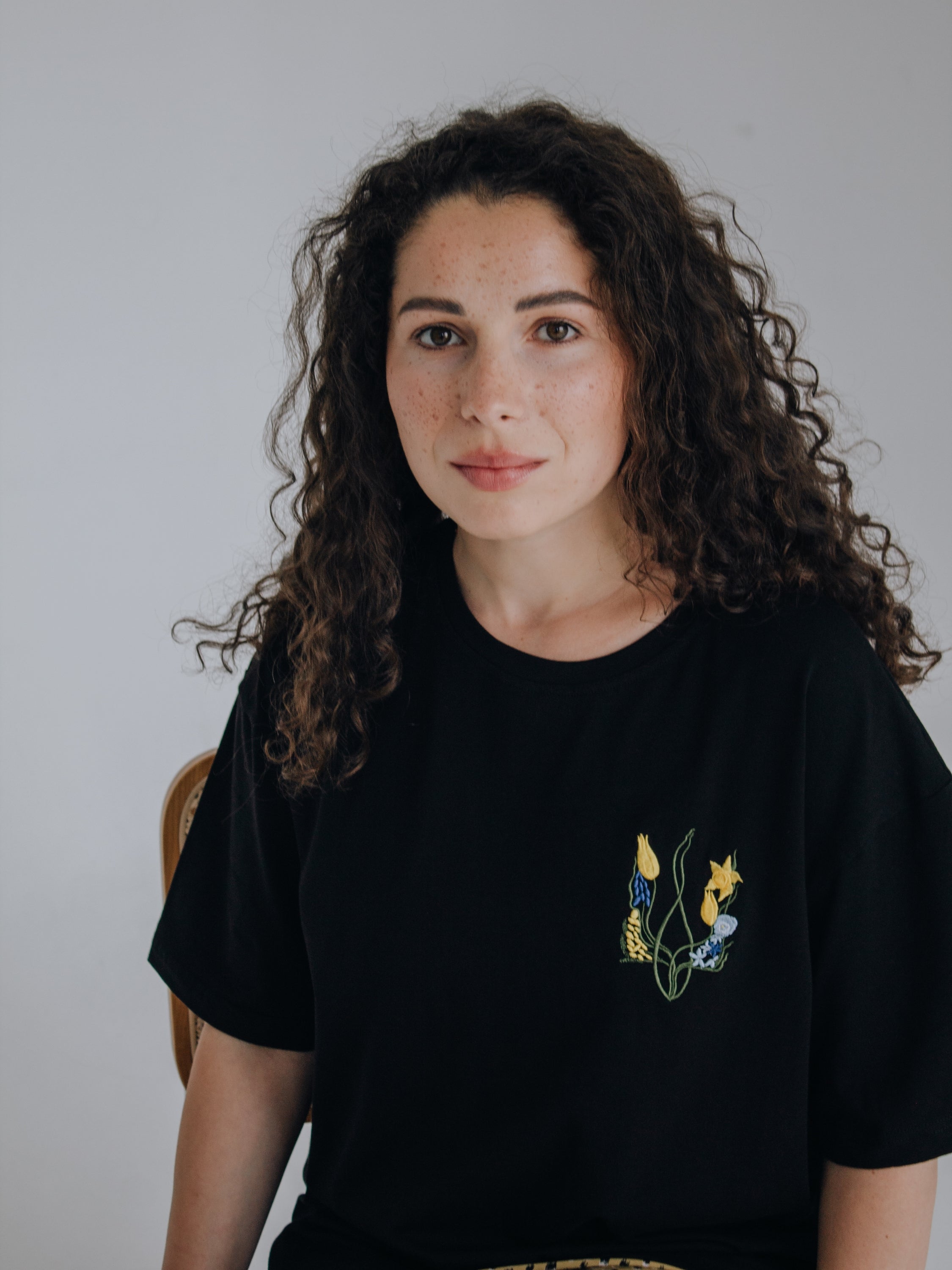 T-shirt "Blossoming Trident" print on left side