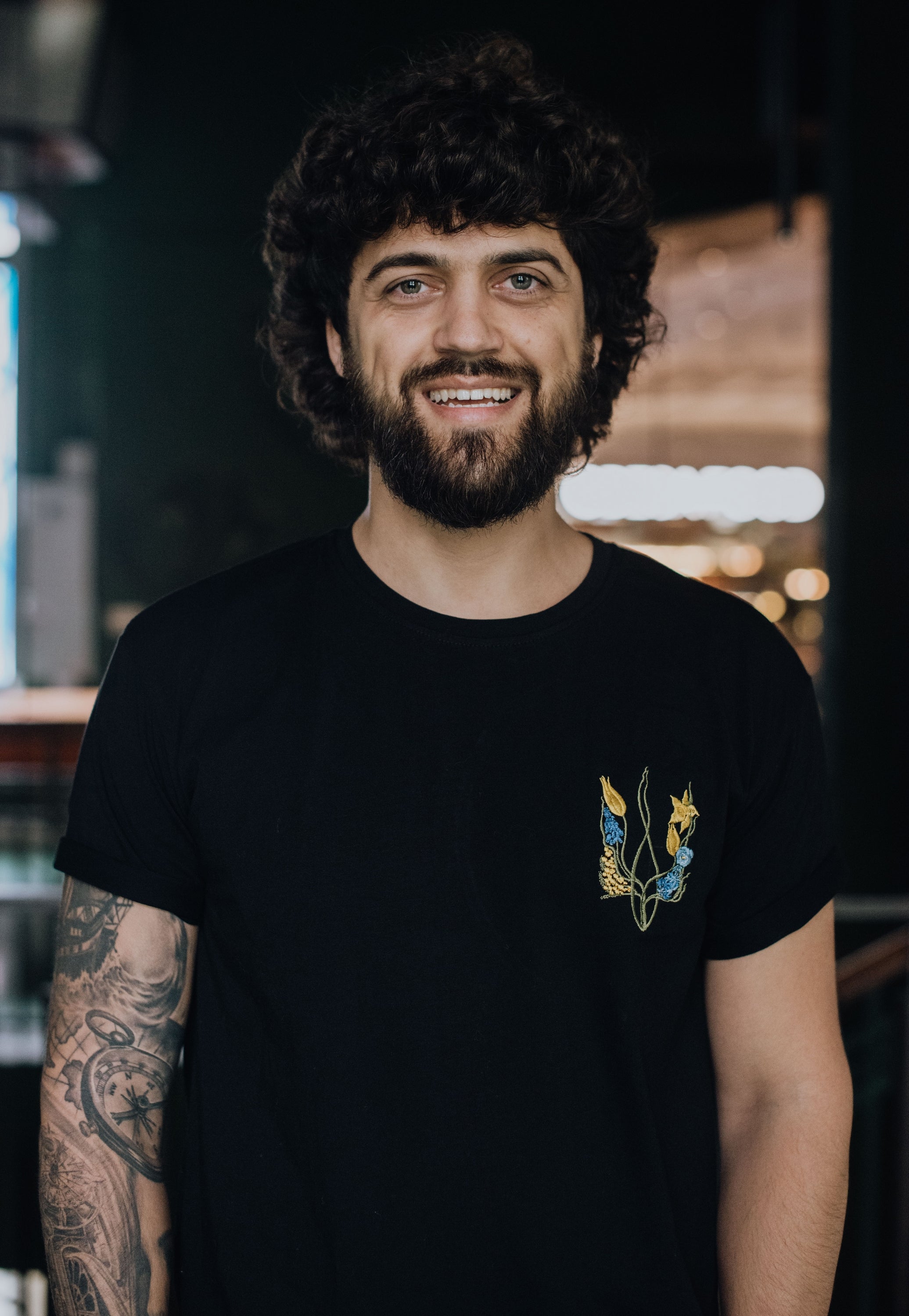 T-shirt "Blossoming Trident" print on left side