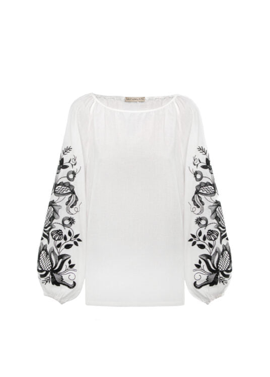 Blouse based on the motifs of a traditional shirt with designer embroidery (black ornament)