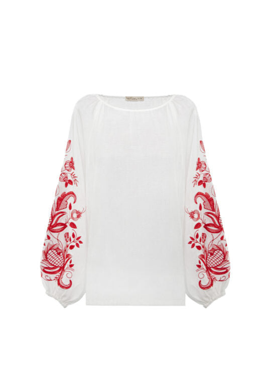 Blouse based on the motifs of a traditional shirt with designer embroidery
