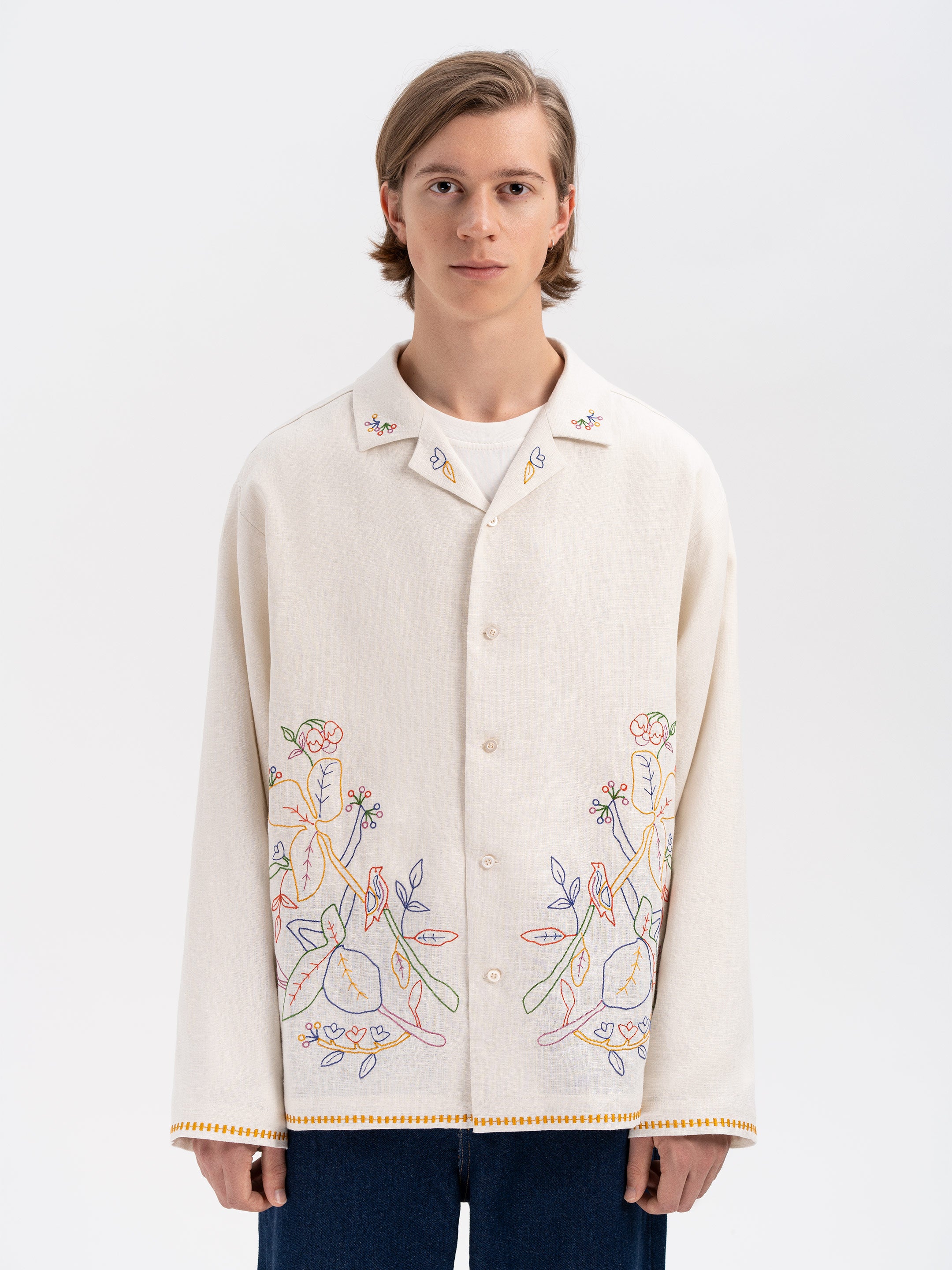 Light shirt with colored embroidery "Hlid"