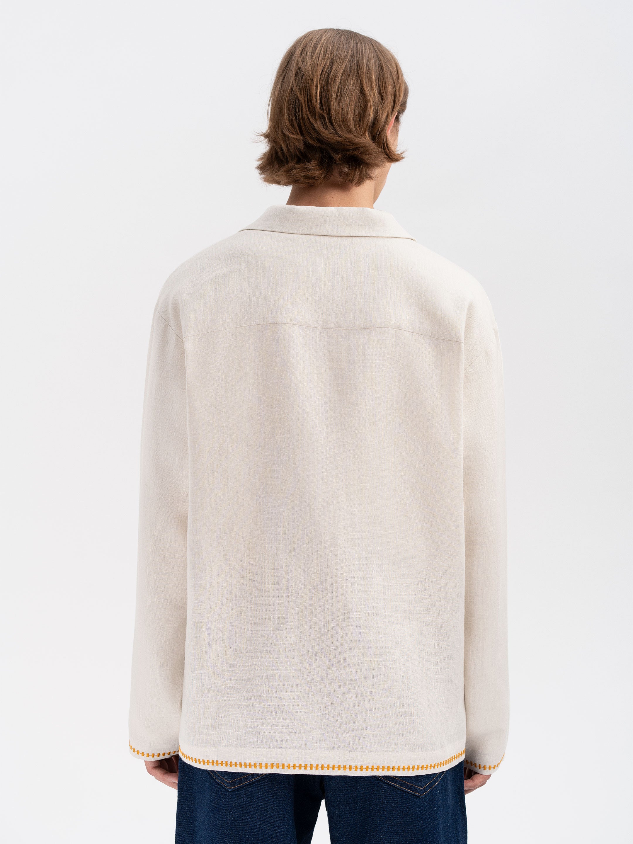 Light shirt with colored embroidery "Hlid"