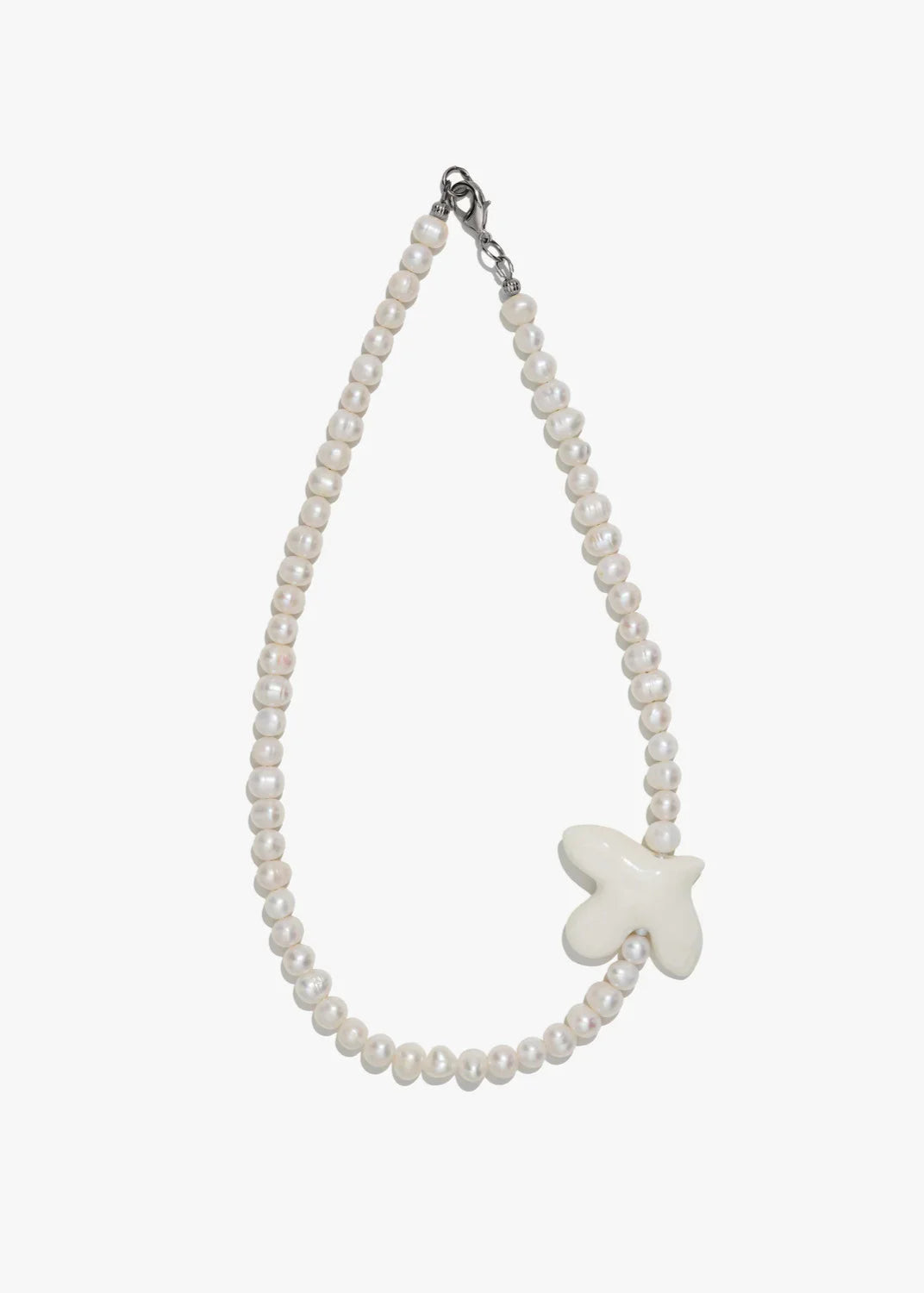 Necklace "Myrni" pearls and a dove on a soft base