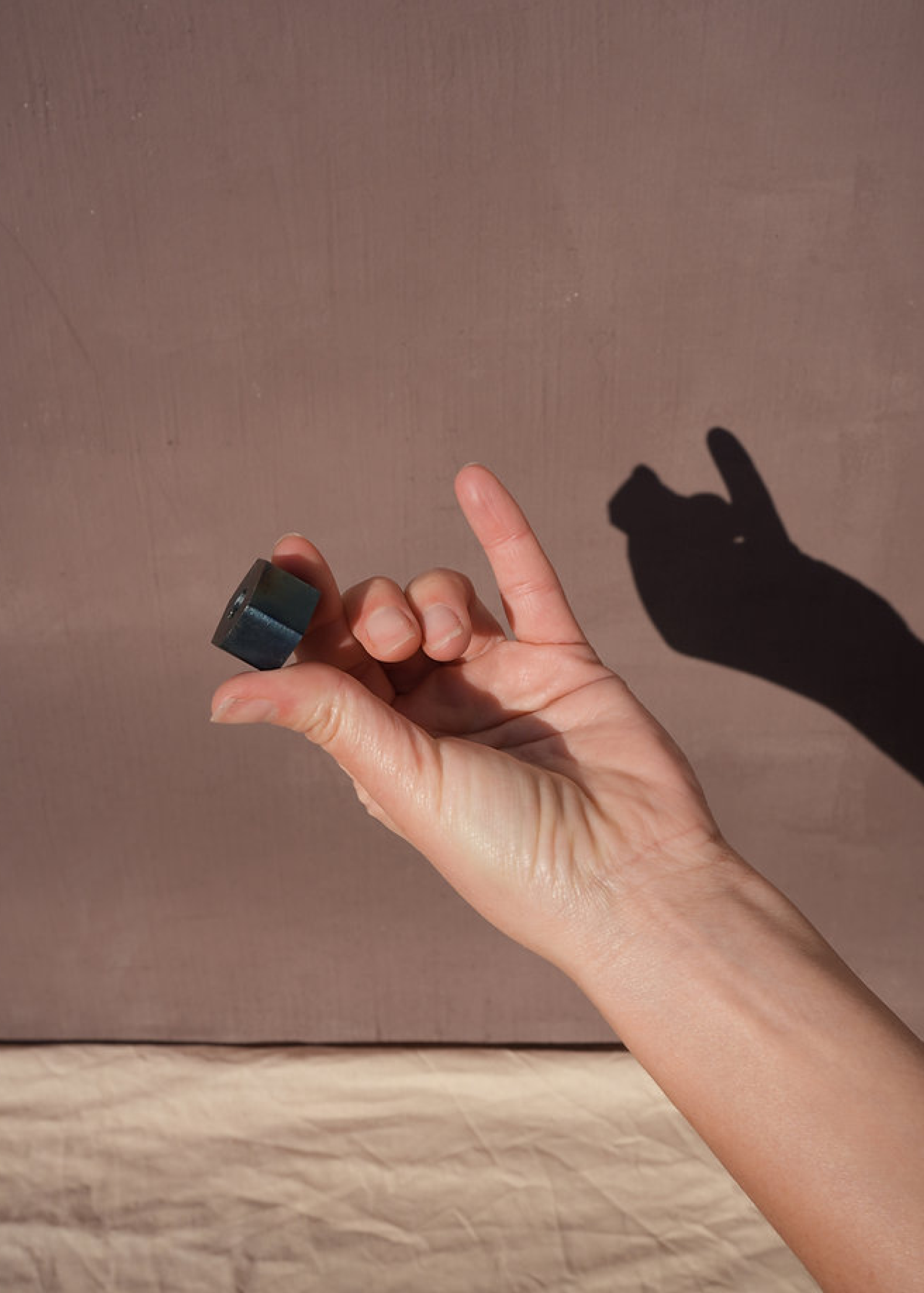 Metal “washer” candle holder