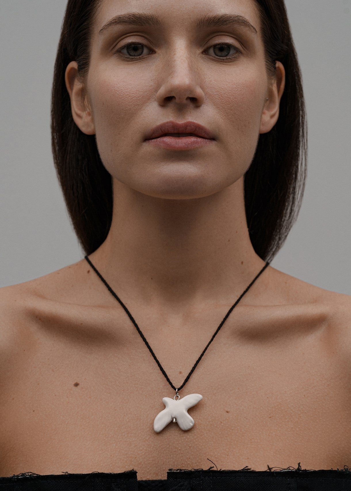 Dove pendant on a cord "MYRNI"