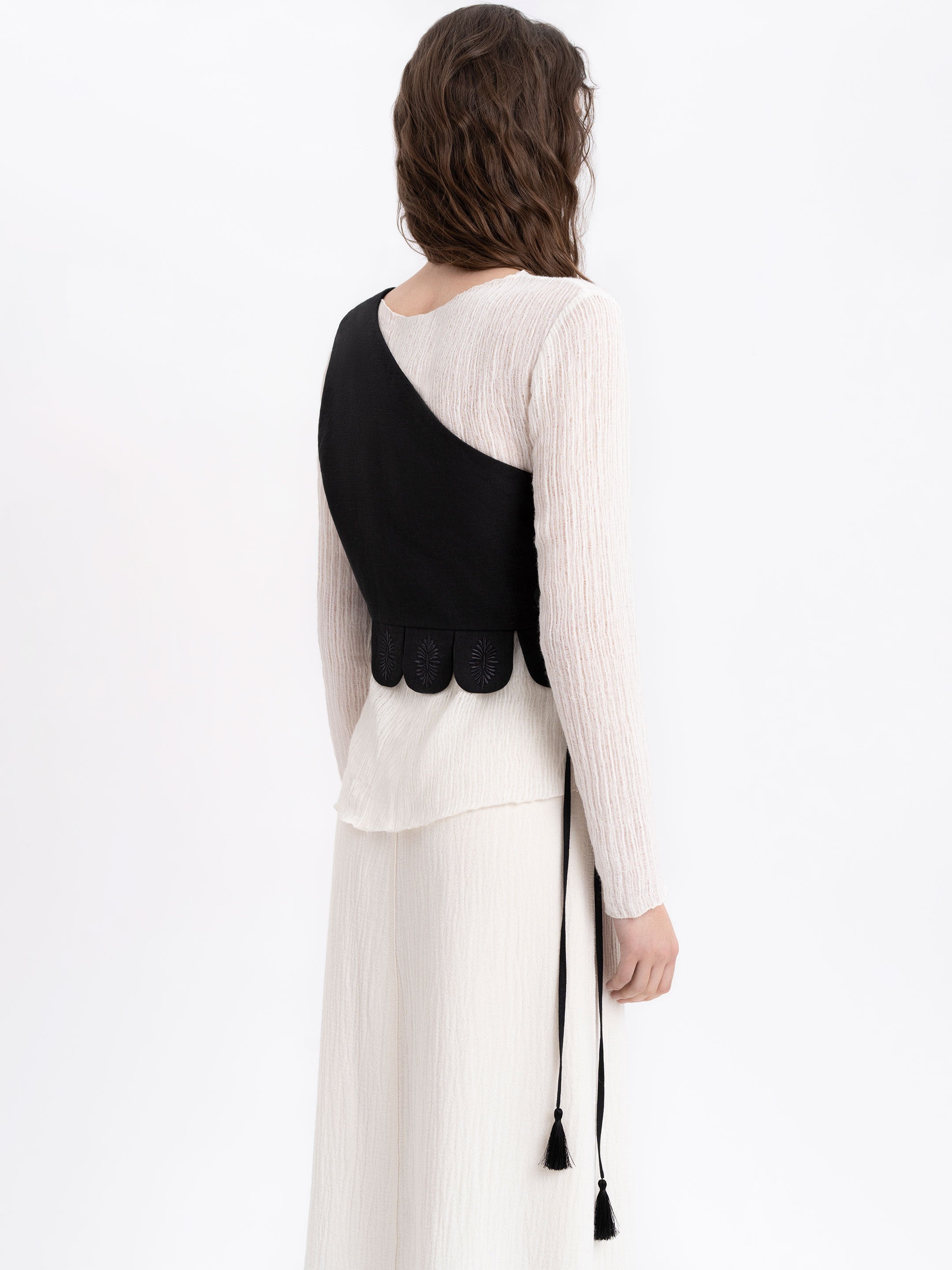 Asymmetric vest with black embroidery in tone "Osiayna"