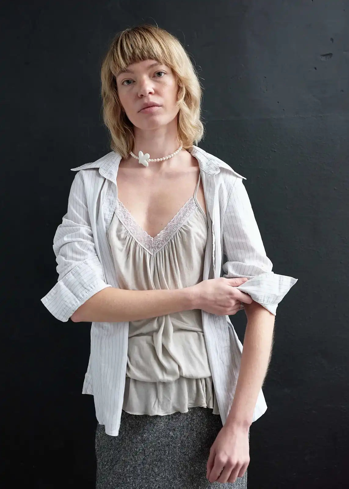 Necklace "Myrni" with medium pearls and a bird