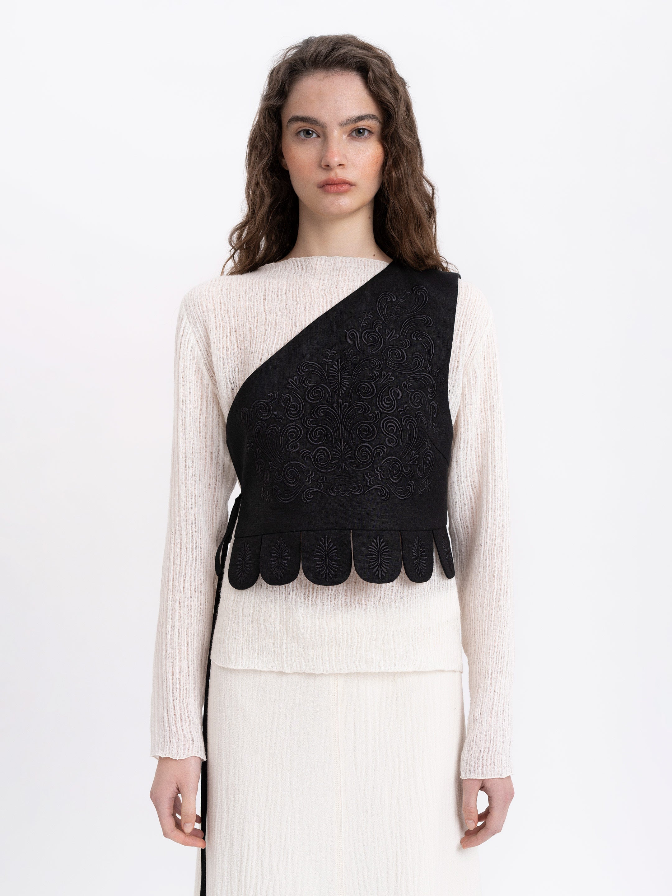 Asymmetric vest with black embroidery in tone "Osiayna"