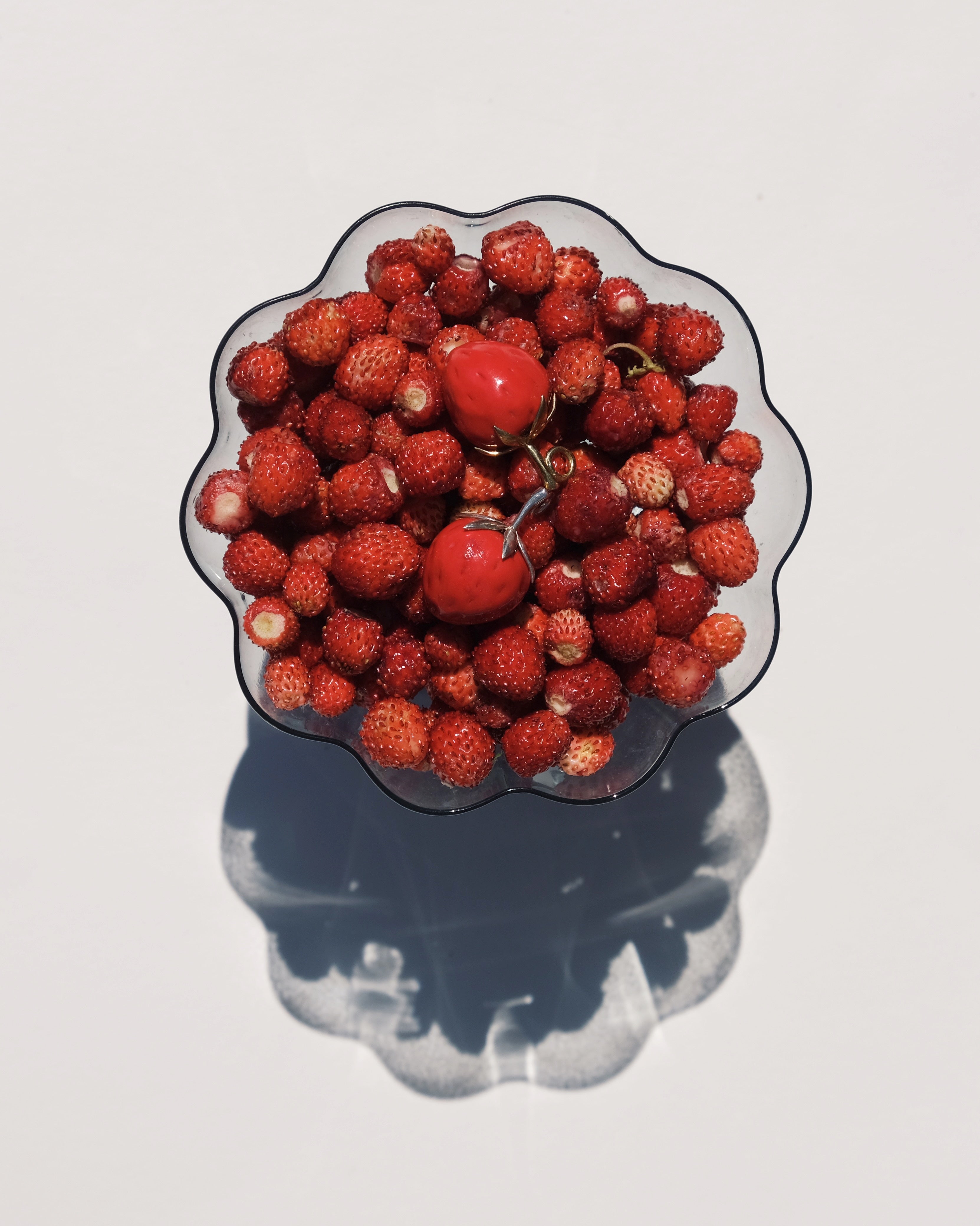 "Strawberry" pendant on a cord (brass)