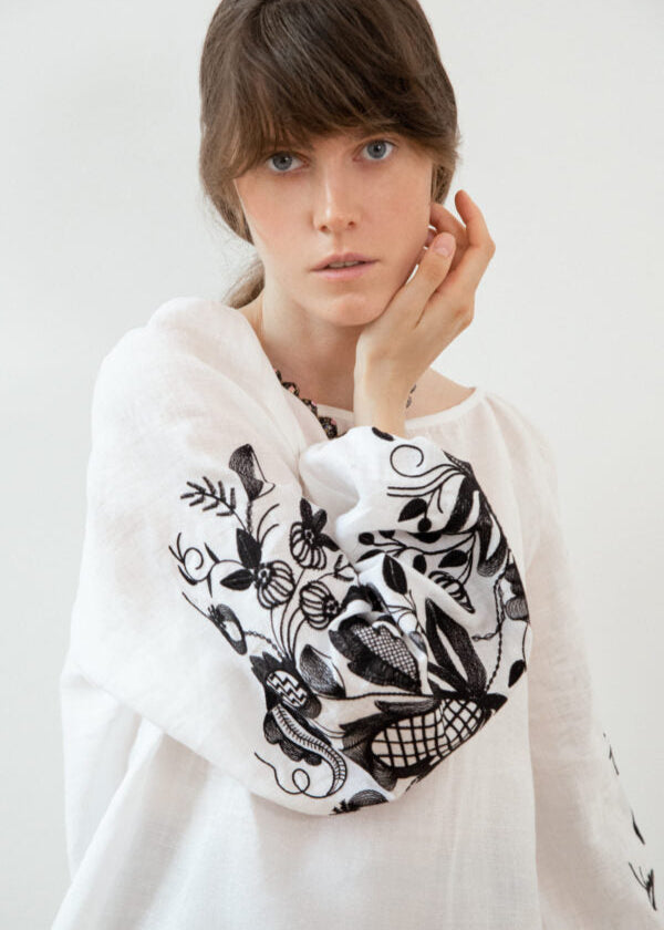 Blouse based on the motifs of a traditional shirt with designer embroidery (black ornament)