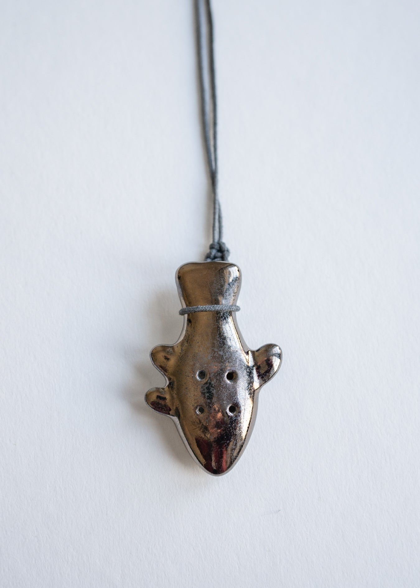 Fish whistle pendant