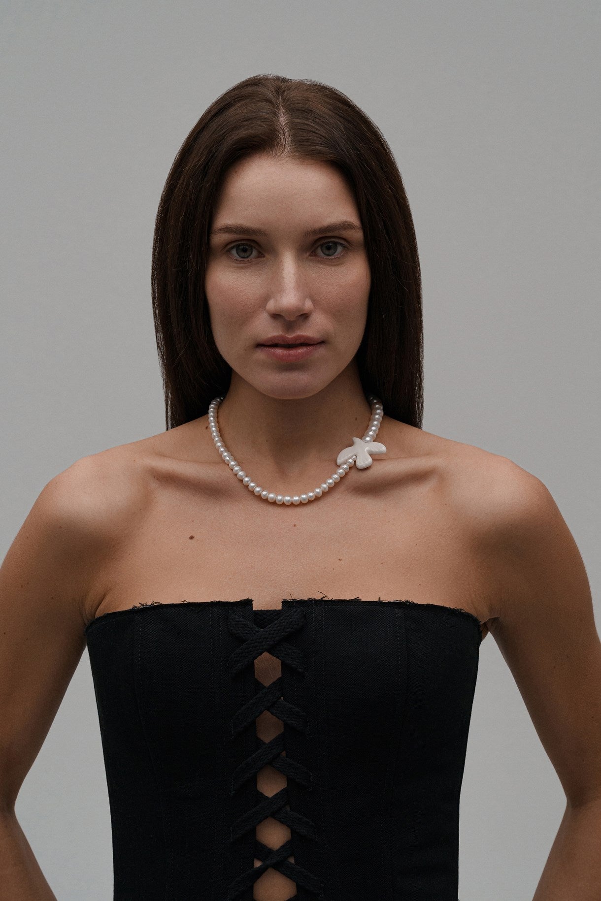 Necklace "Myrni" with two kinds of pearls and a dove