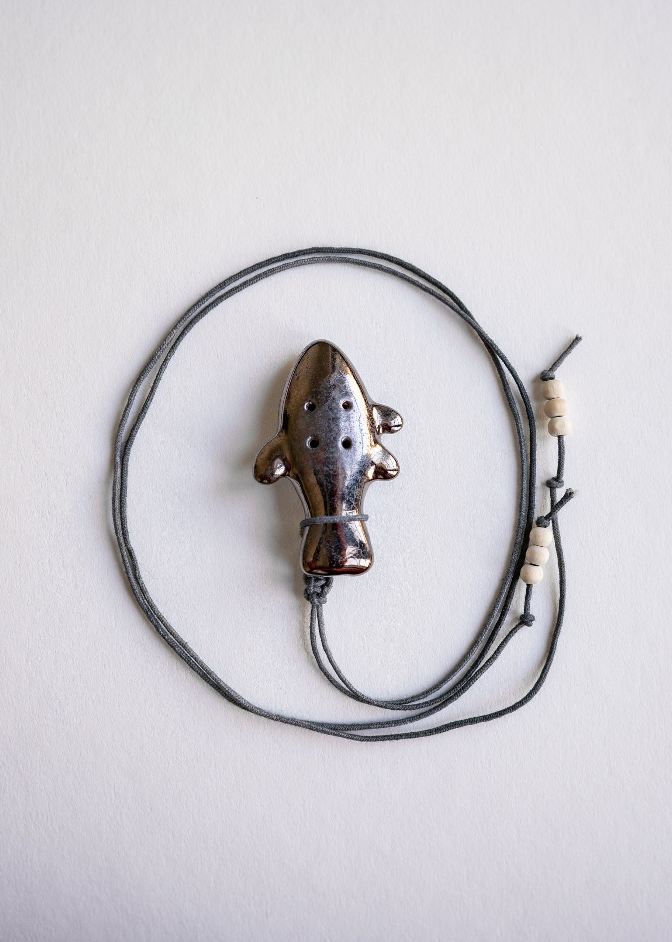 Fish whistle pendant