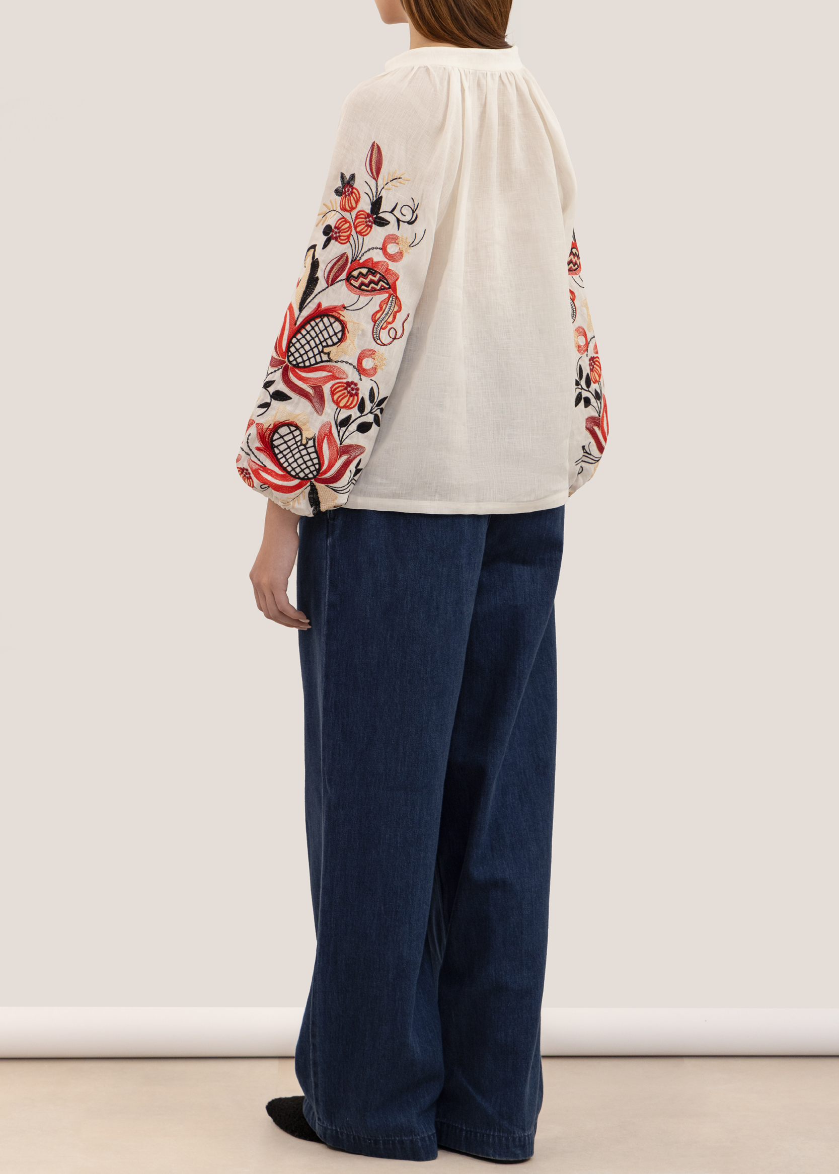 Blouse inspired by a traditional shirt with designer embroidery (colorful ornament)