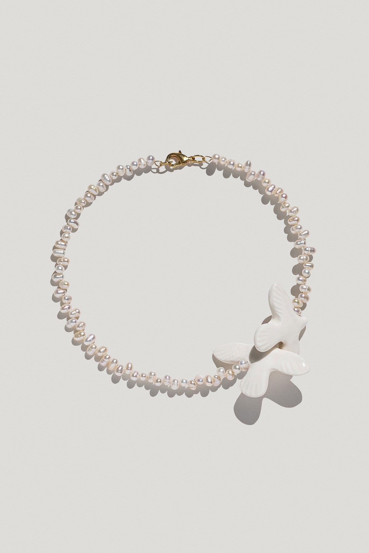 Necklace "Myrni" with pearls and two doves