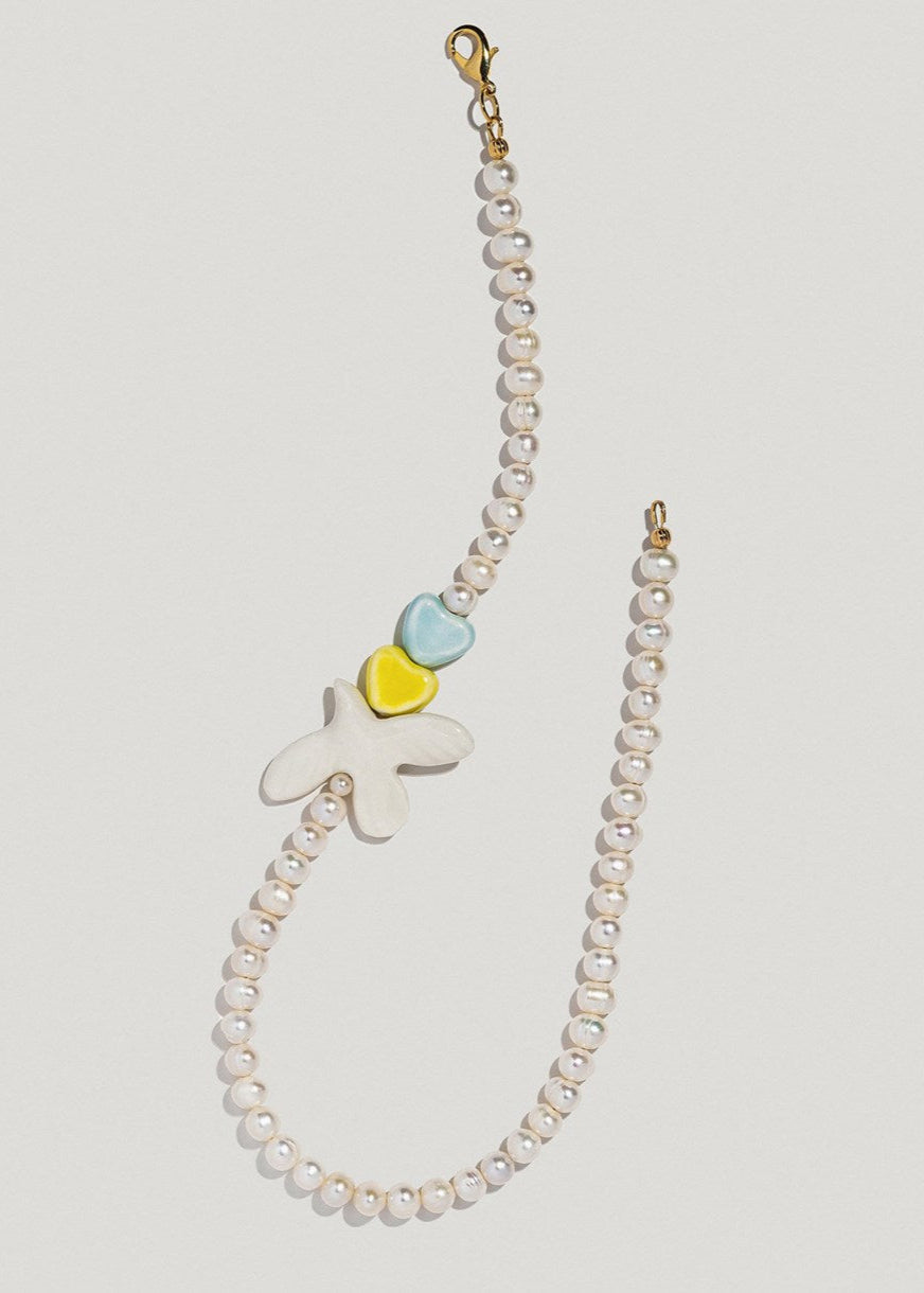 Necklace "Freedom" pearls, dove & hearts