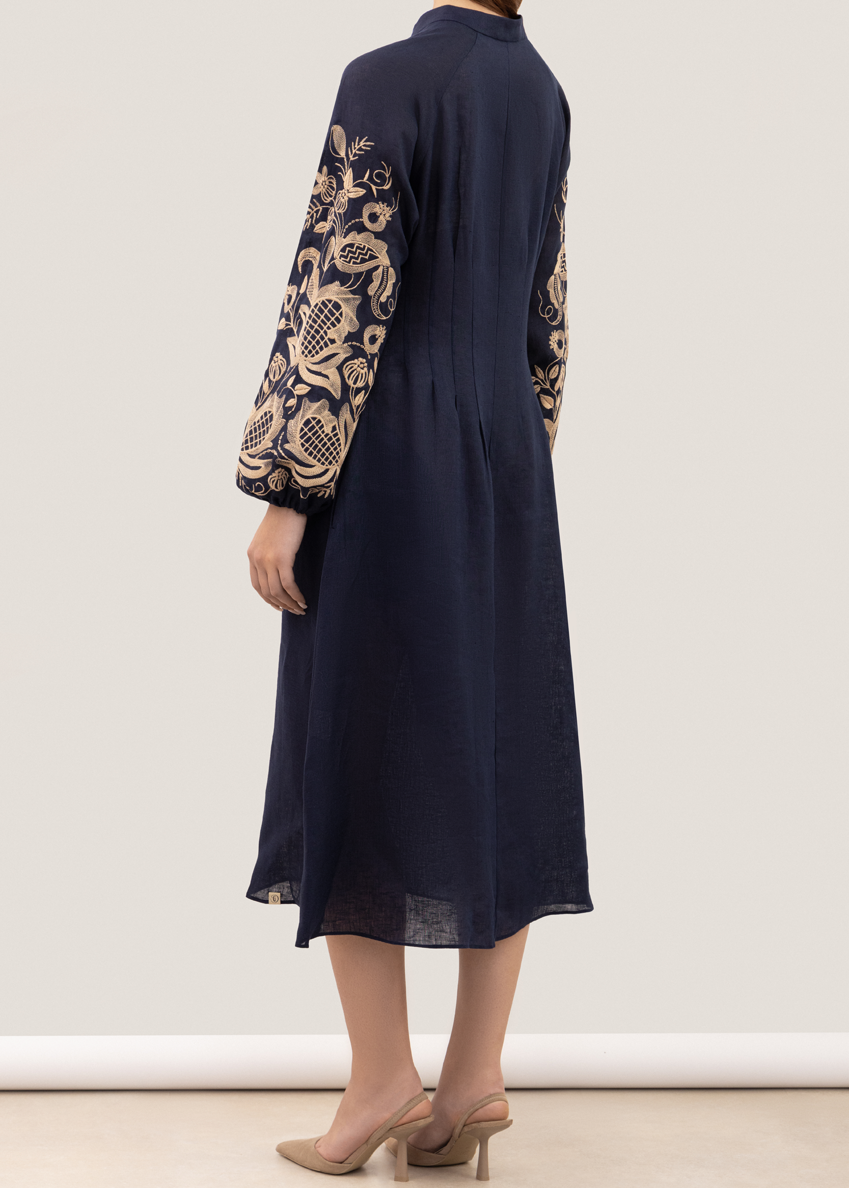 Dress based on the motifs of a traditional shirt with designer embroidery dark blue