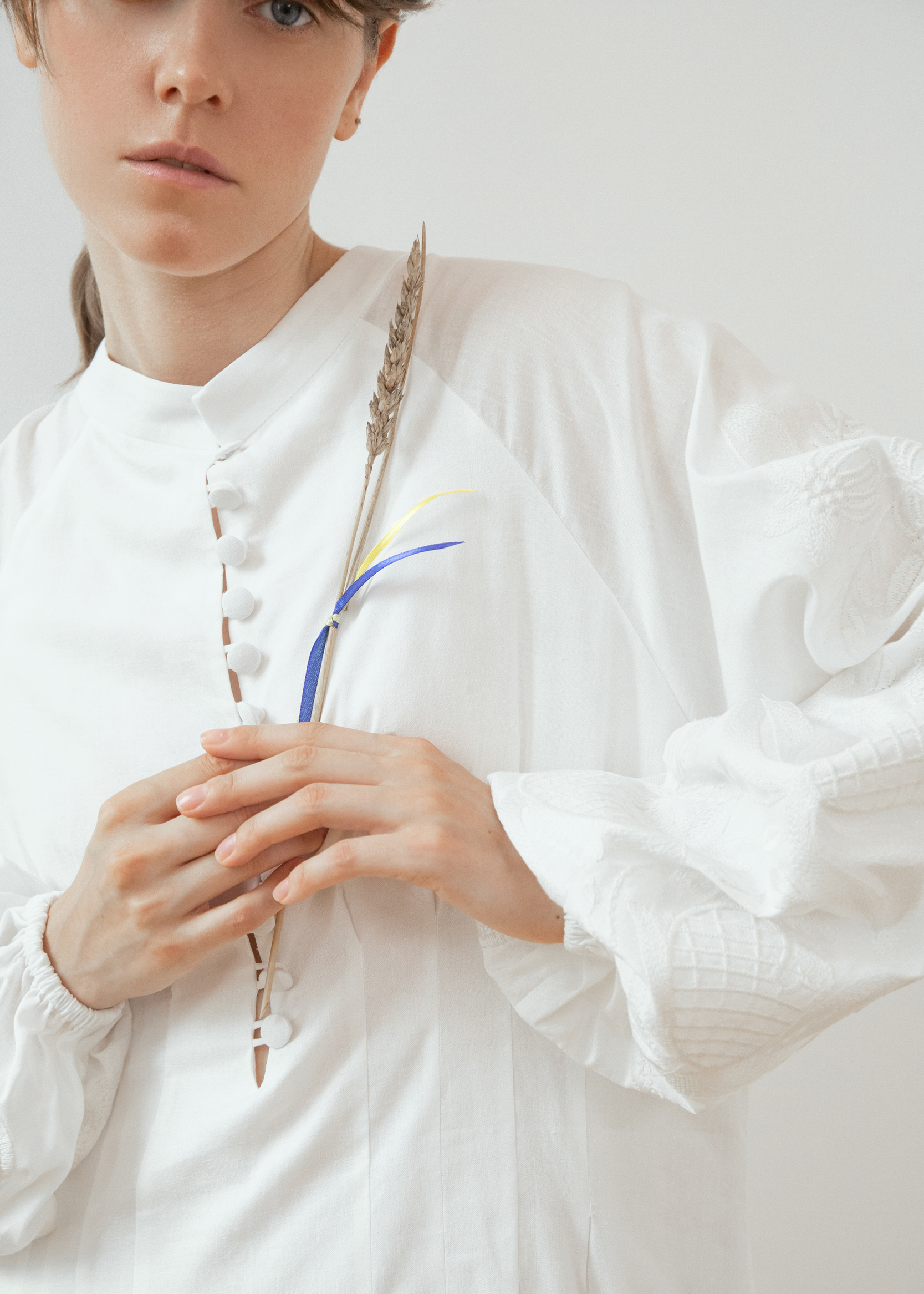 Dress based on the motifs of a traditional shirt with designer embroidery white