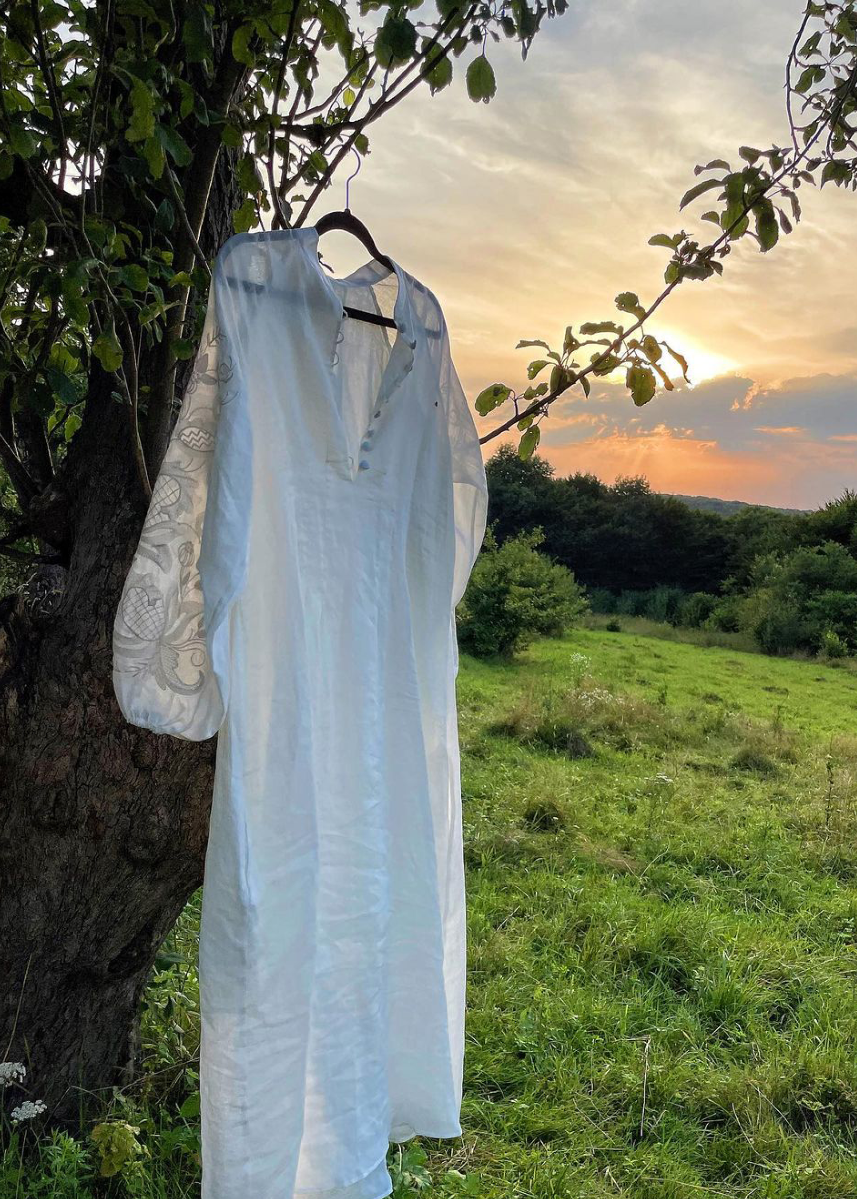 Dress based on the motifs of a traditional shirt with designer embroidery white
