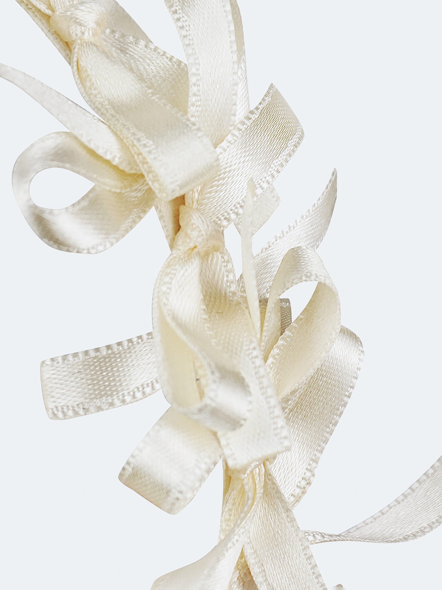 Light summer wreath made of milk-colored satin thread "Lebidka"