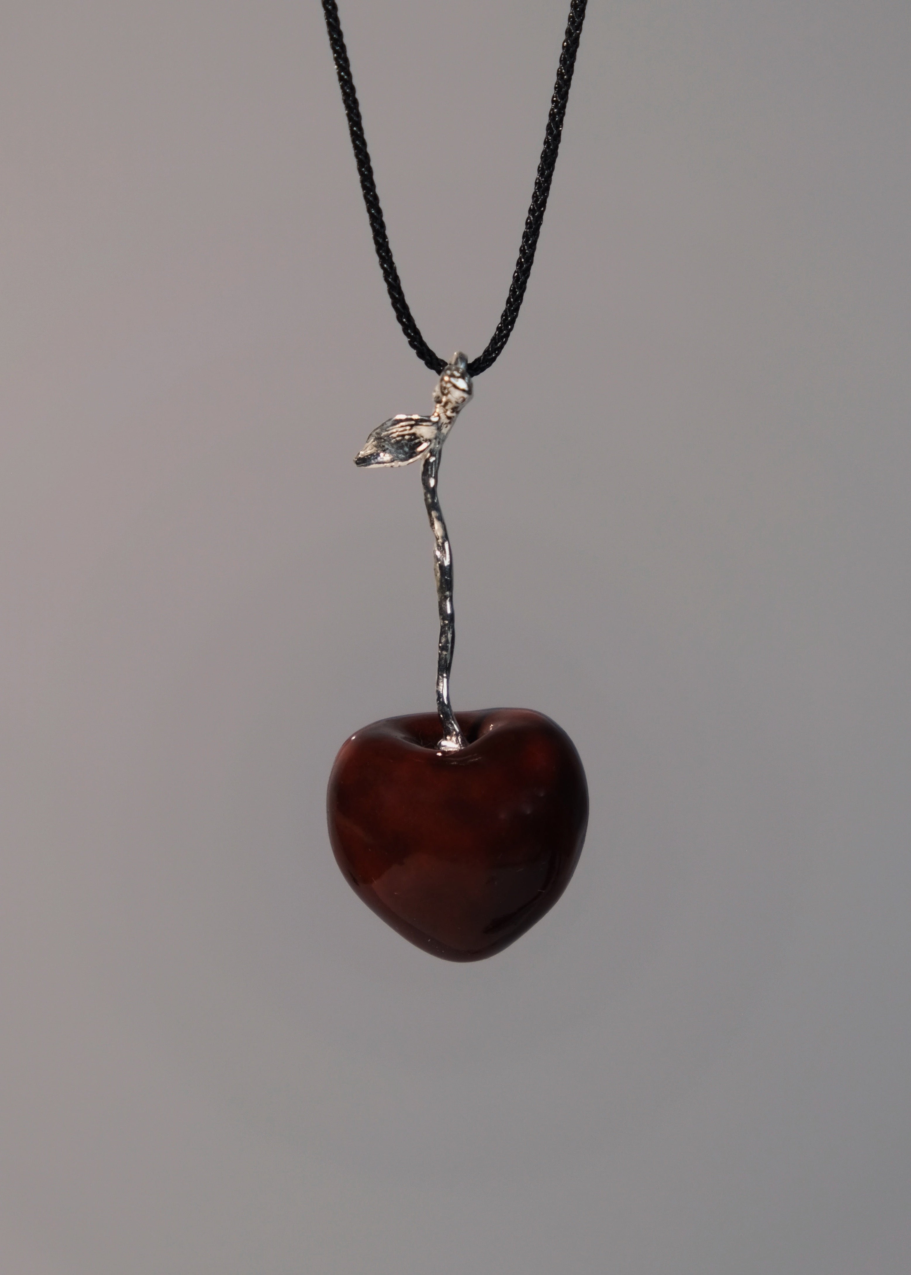 "Cherry" pendant on a cord (silver)