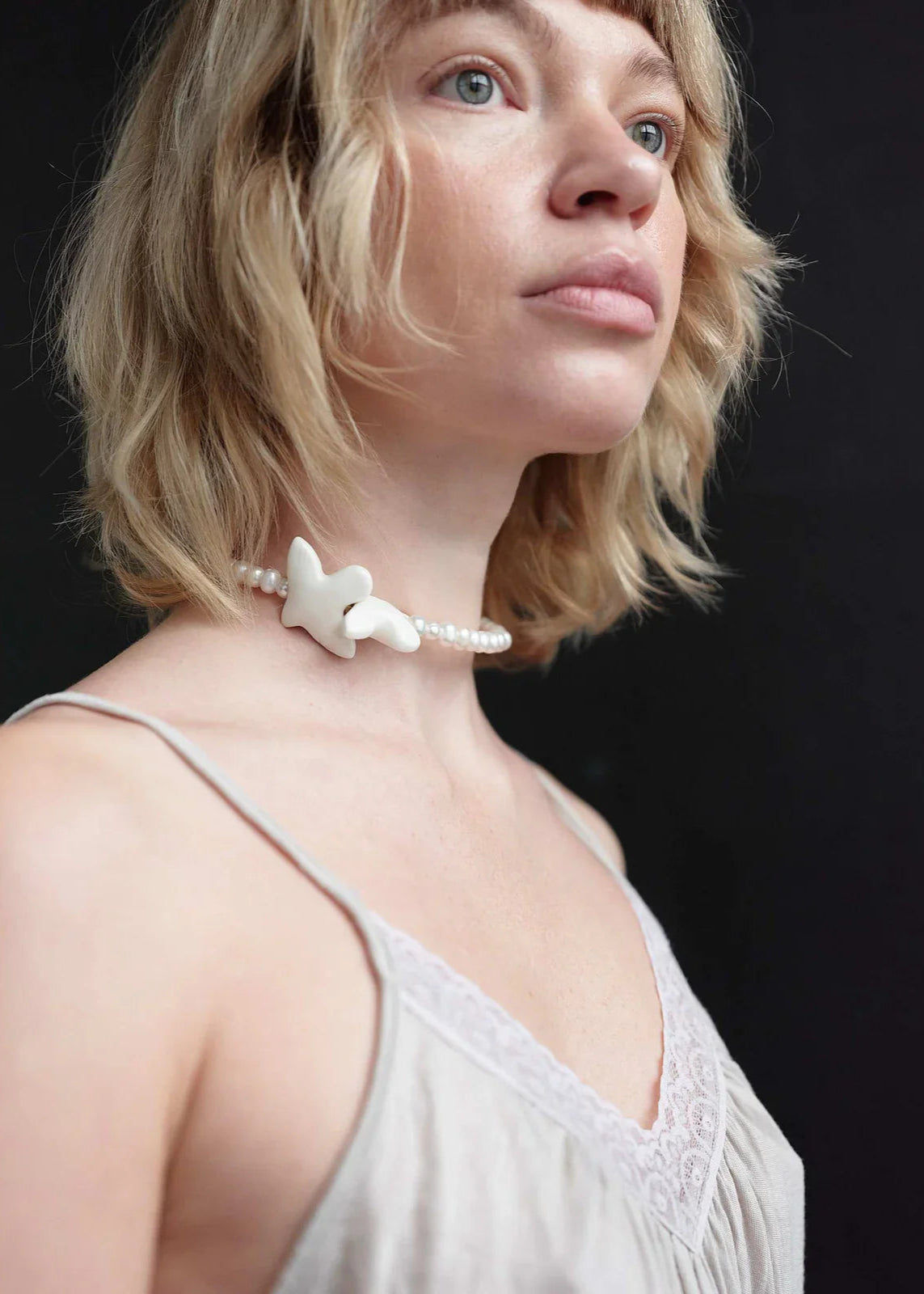 Necklace "Myrni" with medium pearls and two doves
