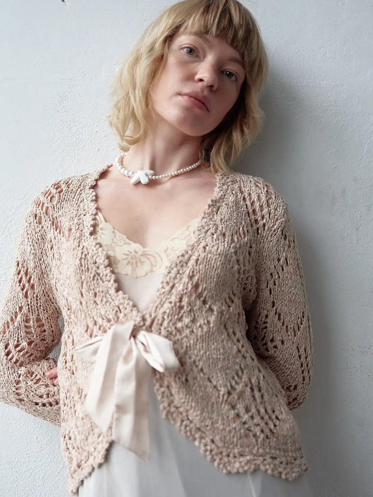 Necklace "Myrni" with two kinds of pearls and a dove