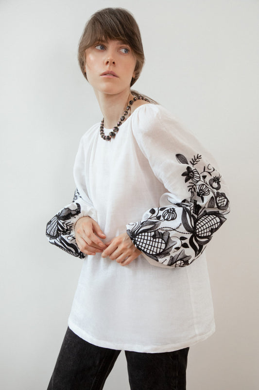 Blouse based on the motifs of a traditional shirt with designer embroidery (black ornament)